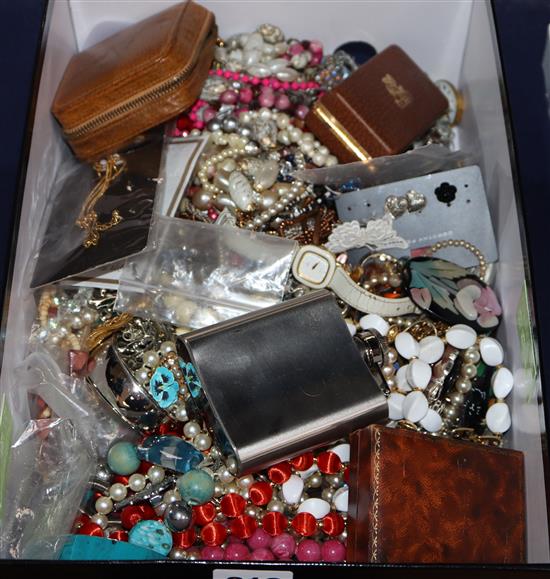 A large quantity of assorted costume jewellery including silver charms